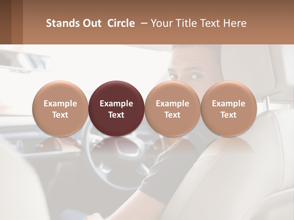 A Man Sitting In A Car With A Steering Wheel PowerPoint Template