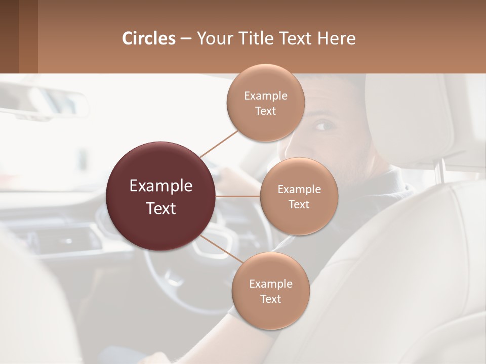 A Man Sitting In A Car With A Steering Wheel PowerPoint Template