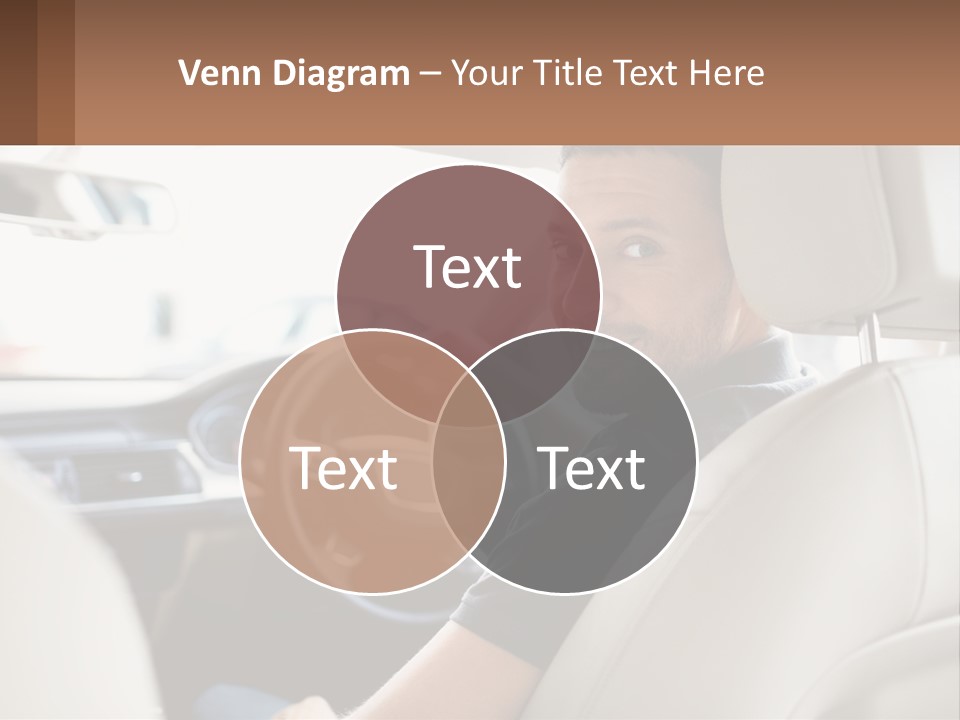 A Man Sitting In A Car With A Steering Wheel PowerPoint Template