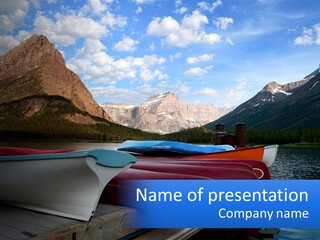 A Row Of Canoes On A Lake With Mountains In The Background PowerPoint Template