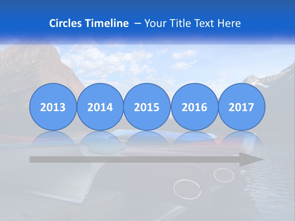 A Row Of Canoes On A Lake With Mountains In The Background PowerPoint Template