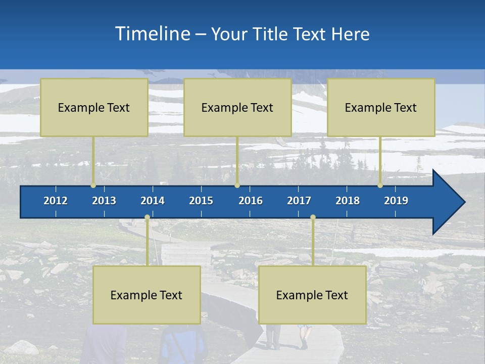 A Group Of People Walking Down A Path Towards A Mountain PowerPoint Template