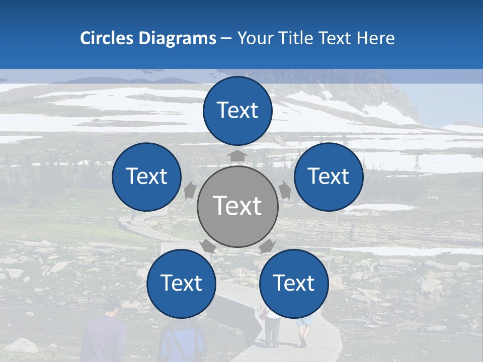 A Group Of People Walking Down A Path Towards A Mountain PowerPoint Template