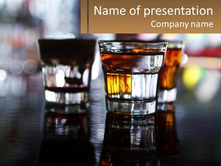 Two Glasses Of Alcohol On A Table With A Brown Background PowerPoint Template