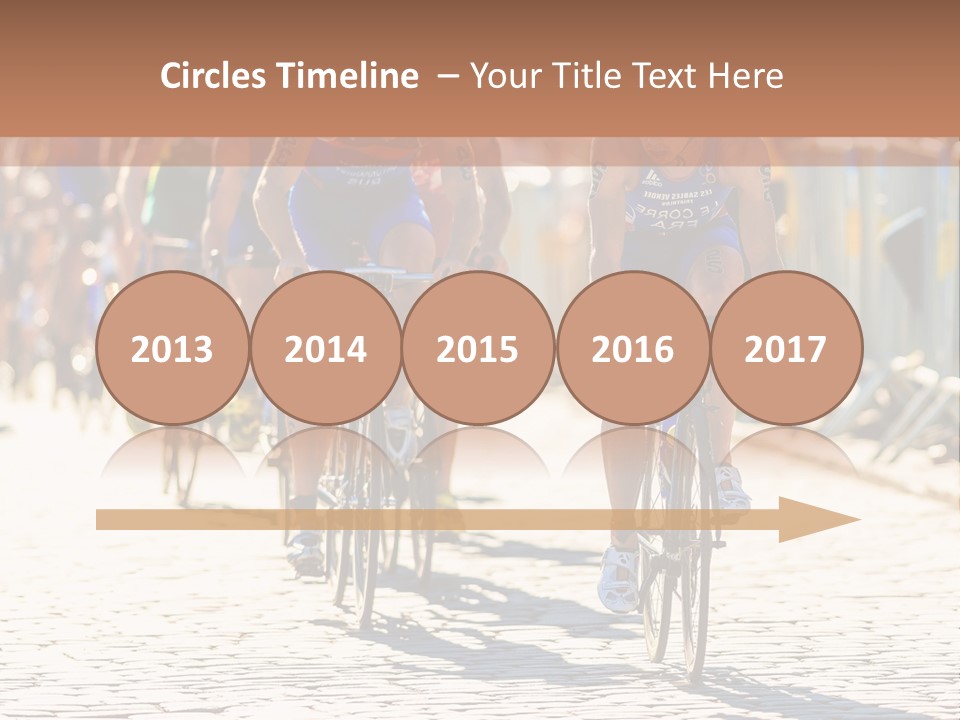 A Group Of People Riding Bikes Down A Street PowerPoint Template