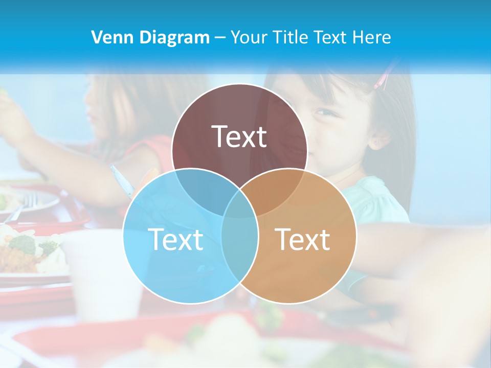 A Group Of Children Sitting At A Table Eating Food PowerPoint Template
