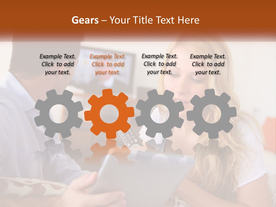 A Man And A Woman Sitting In Front Of A Television PowerPoint Template