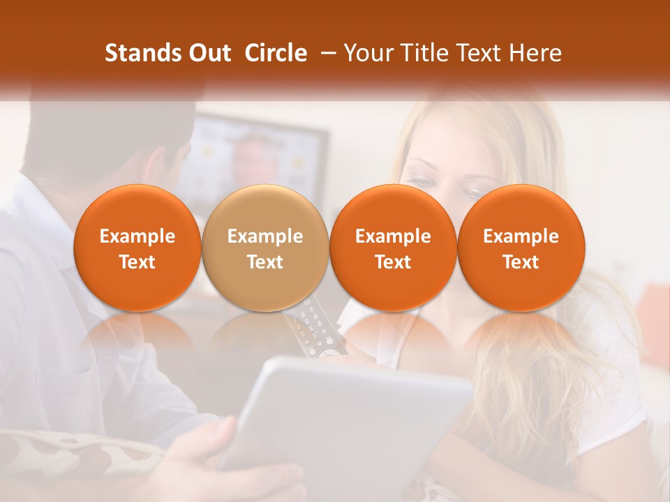 A Man And A Woman Sitting In Front Of A Television PowerPoint Template