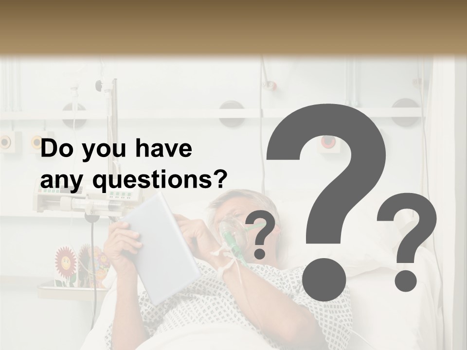 A Man Laying In A Hospital Bed Reading A Book PowerPoint Template