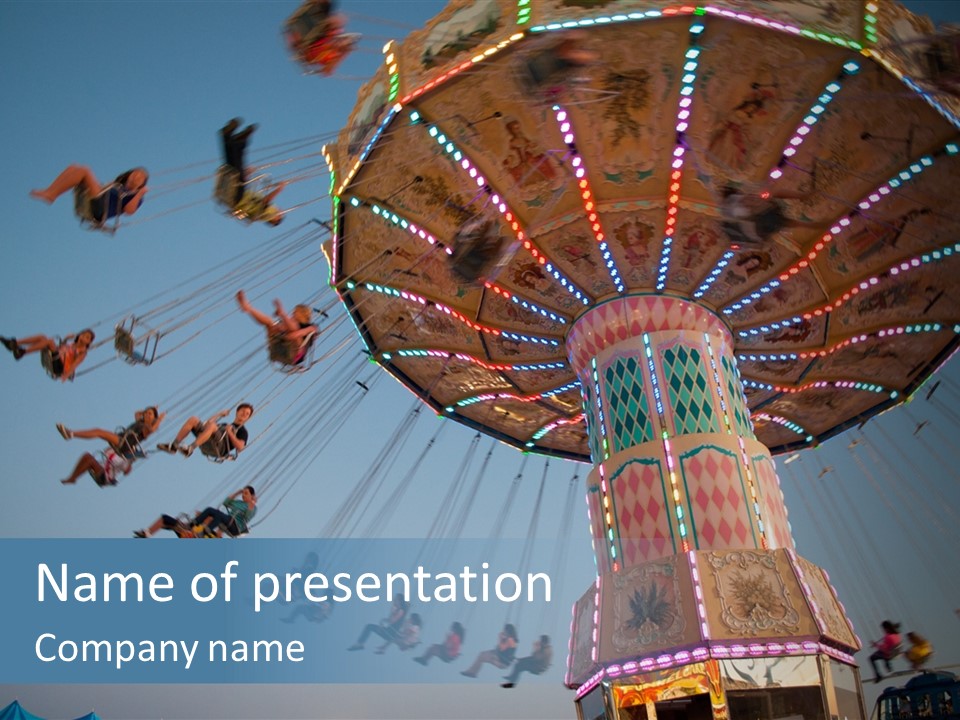 A Merry Go Round Ride With People On It PowerPoint Template