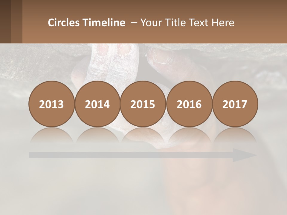 A Person Is Holding Their Hand Up To A Rock PowerPoint Template