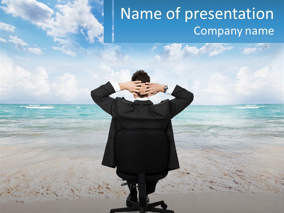 A Man Sitting At A Desk With His Hands On His Head PowerPoint Template