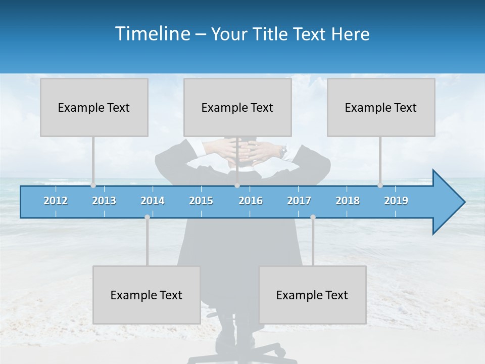 A Man Sitting At A Desk With His Hands On His Head PowerPoint Template