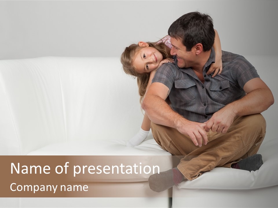 A Man And A Woman Sitting On A White Couch PowerPoint Template