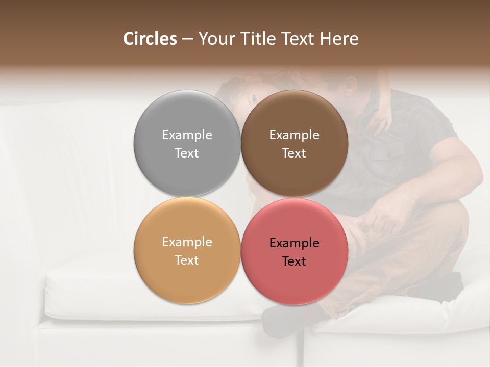 A Man And A Woman Sitting On A White Couch PowerPoint Template