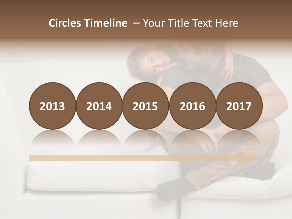 A Man And A Woman Sitting On A White Couch PowerPoint Template