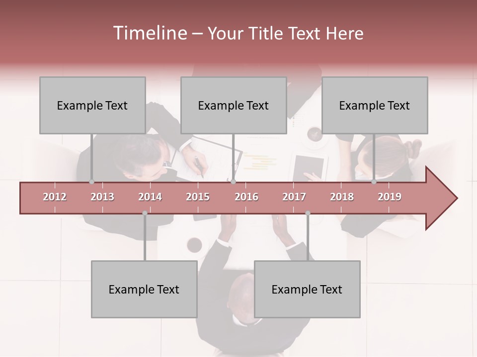 A Group Of People Sitting Around A Table PowerPoint Template