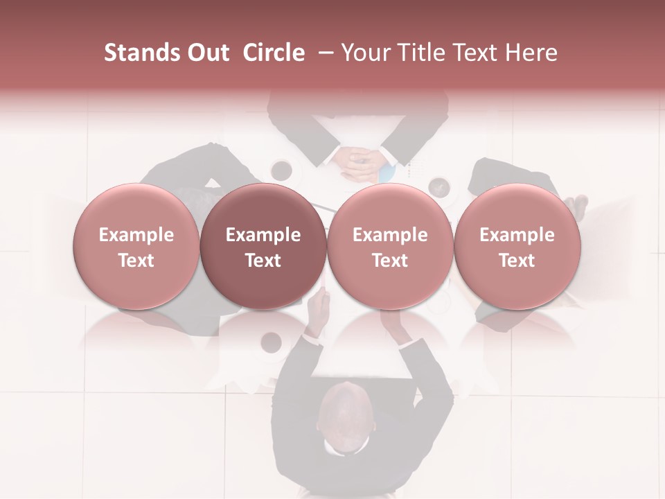 A Group Of People Sitting Around A Table PowerPoint Template