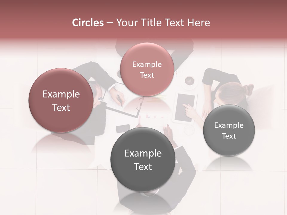 A Group Of People Sitting Around A Table PowerPoint Template