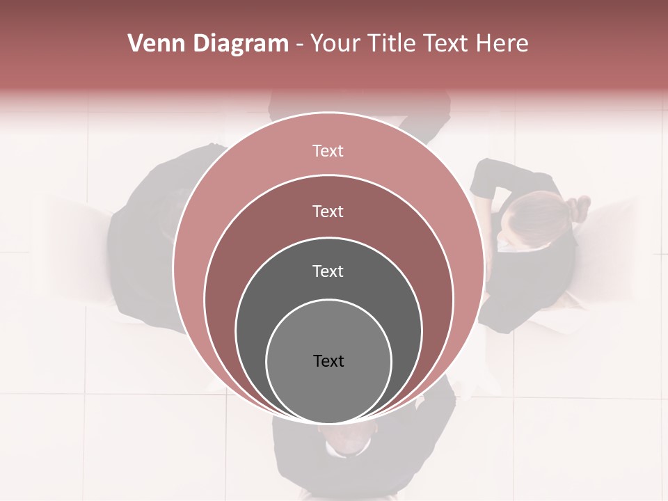 A Group Of People Sitting Around A Table PowerPoint Template