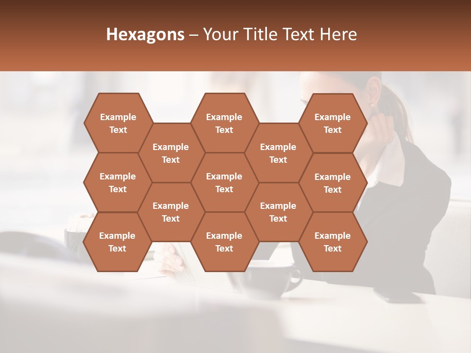 A Woman Sitting At A Table Using A Laptop Computer PowerPoint Template