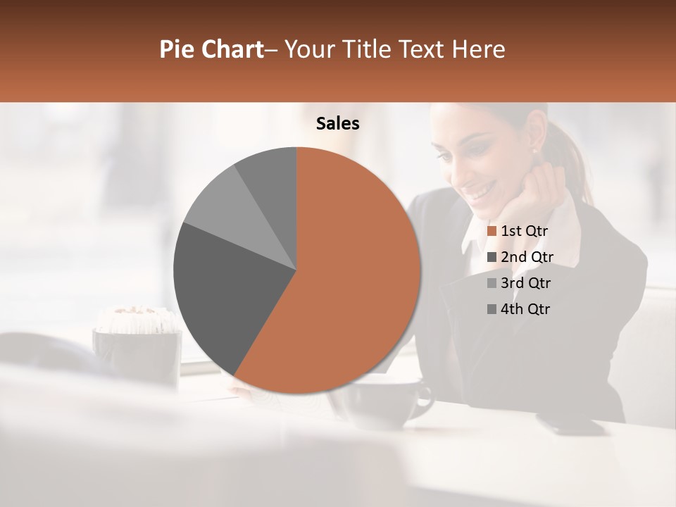 A Woman Sitting At A Table Using A Laptop Computer PowerPoint Template