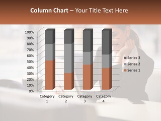 A Woman Sitting At A Table Using A Laptop Computer PowerPoint Template