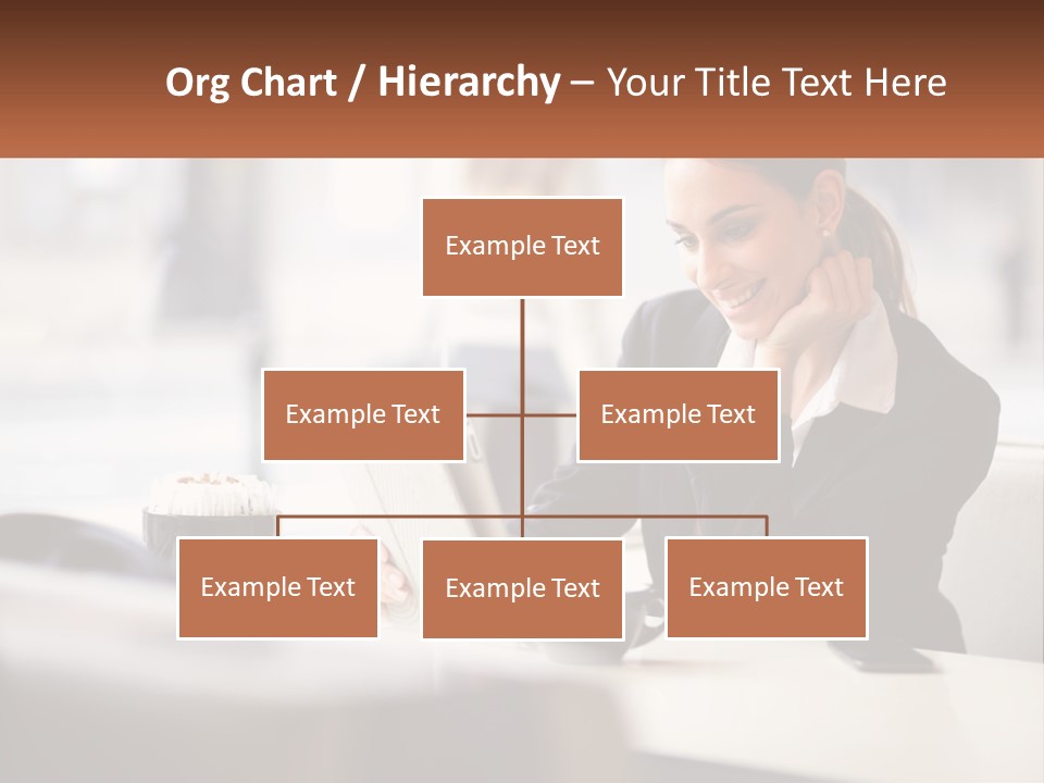 A Woman Sitting At A Table Using A Laptop Computer PowerPoint Template