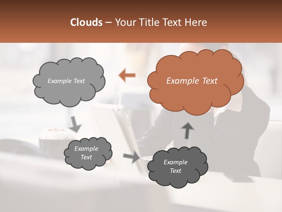 A Woman Sitting At A Table Using A Laptop Computer PowerPoint Template