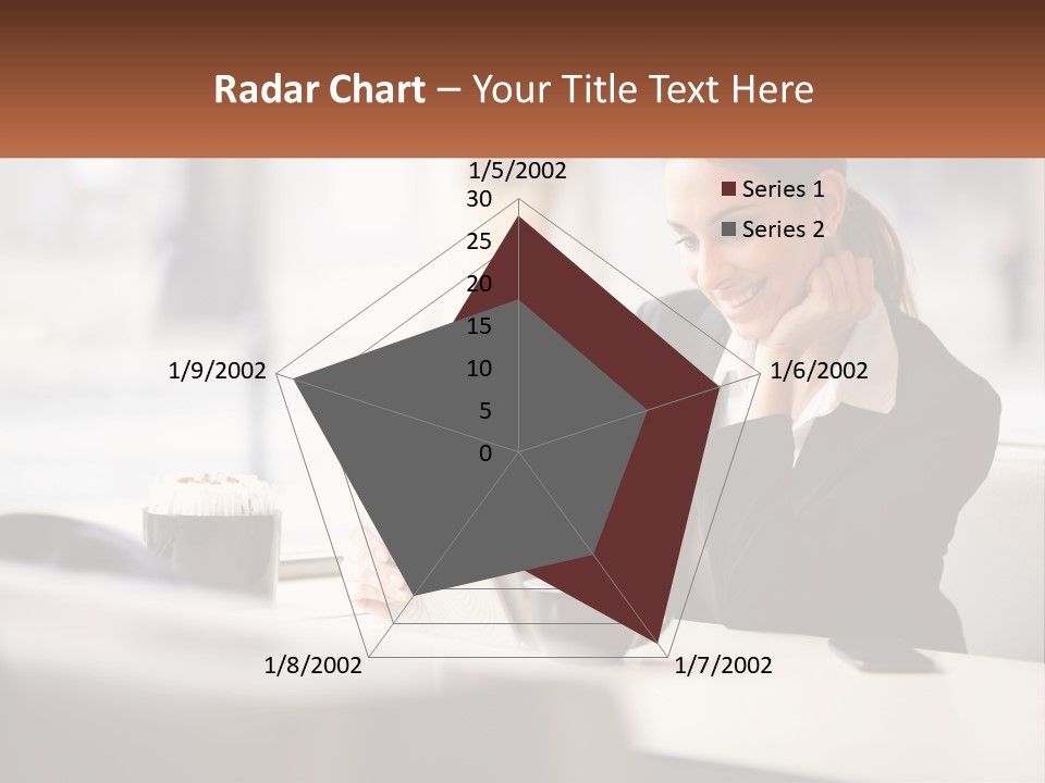 A Woman Sitting At A Table Using A Laptop Computer PowerPoint Template