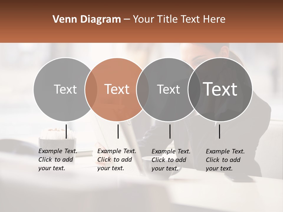 A Woman Sitting At A Table Using A Laptop Computer PowerPoint Template