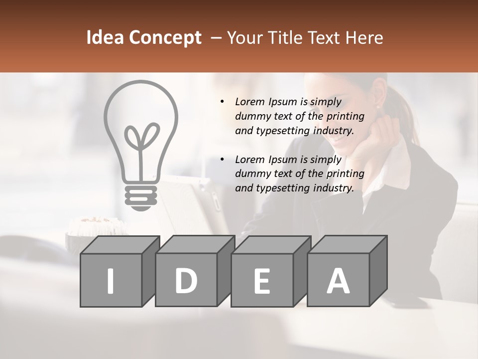 A Woman Sitting At A Table Using A Laptop Computer PowerPoint Template