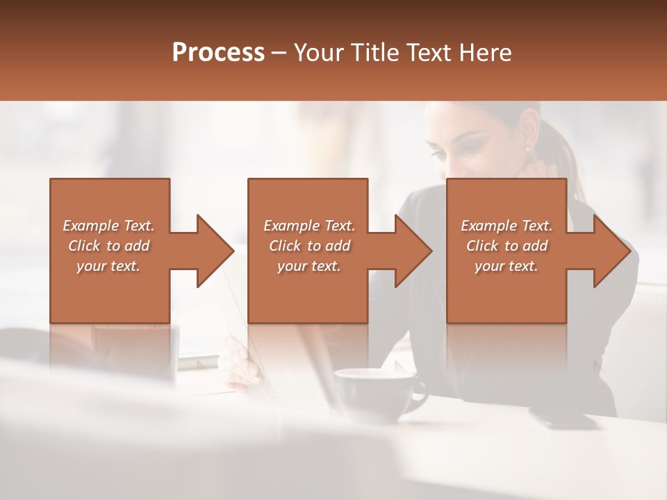 A Woman Sitting At A Table Using A Laptop Computer PowerPoint Template