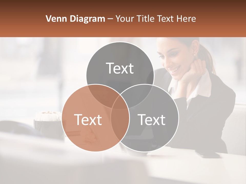 A Woman Sitting At A Table Using A Laptop Computer PowerPoint Template