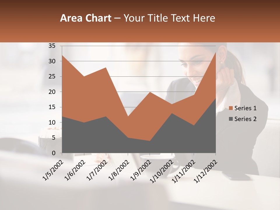 A Woman Sitting At A Table Using A Laptop Computer PowerPoint Template