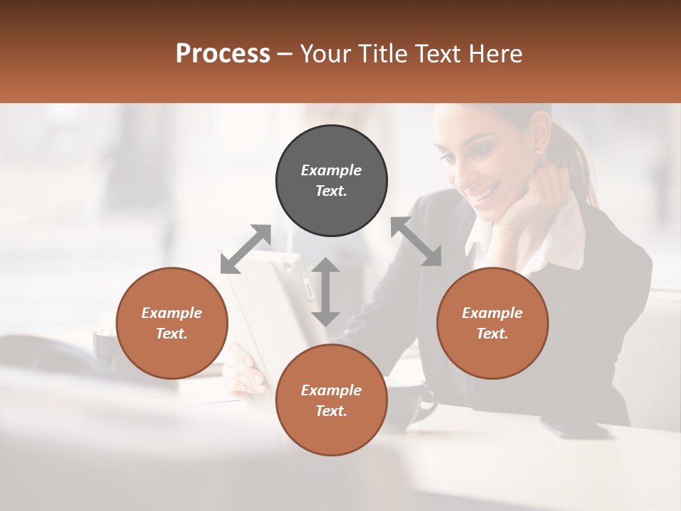 A Woman Sitting At A Table Using A Laptop Computer PowerPoint Template