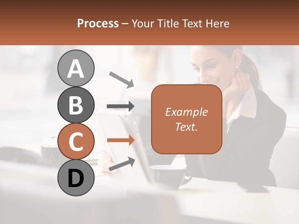 A Woman Sitting At A Table Using A Laptop Computer PowerPoint Template