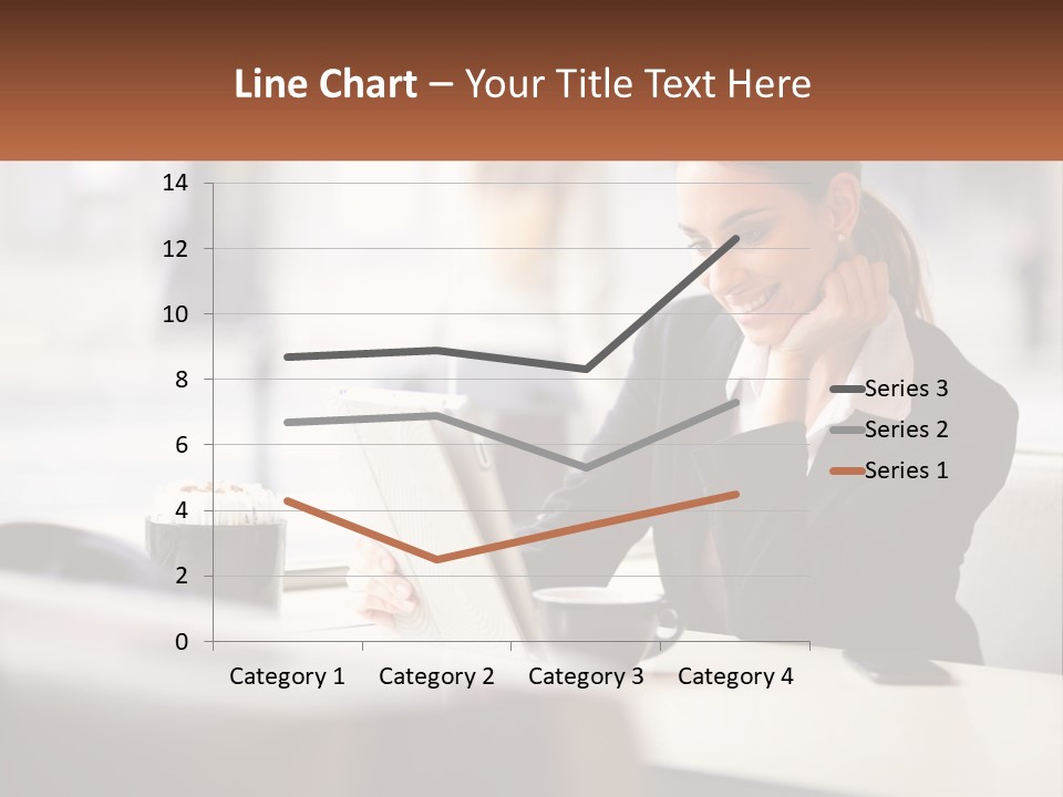 A Woman Sitting At A Table Using A Laptop Computer PowerPoint Template