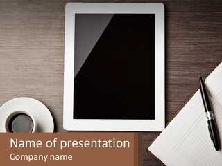 A Tablet Computer Sitting On Top Of A Desk Next To A Cup Of Coffee PowerPoint Template