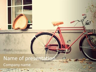 A Red Bike Parked Next To A Window PowerPoint Template