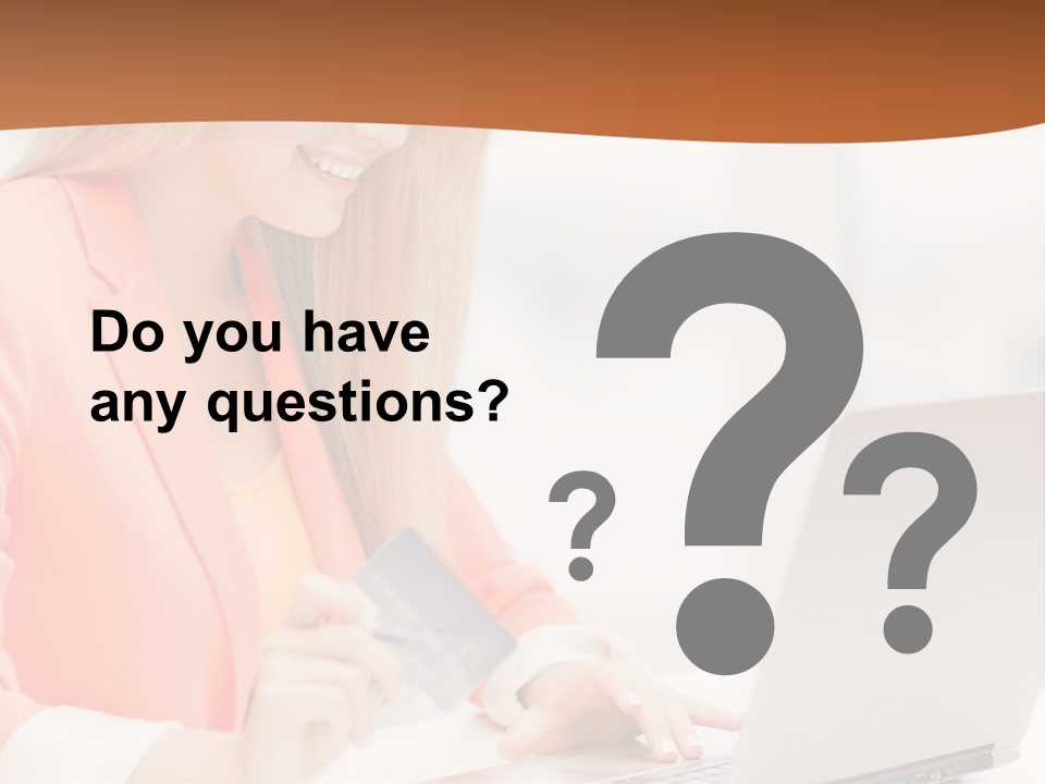 A Woman Holding A Credit Card And Looking At A Laptop PowerPoint Template