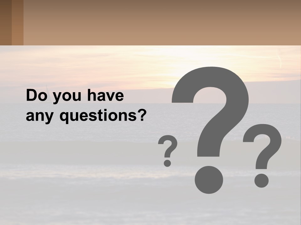 A Sailboat In The Ocean At Sunset PowerPoint Template