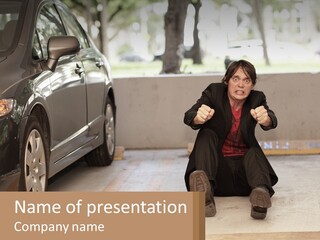 A Woman Sitting On The Ground In Front Of A Car PowerPoint Template