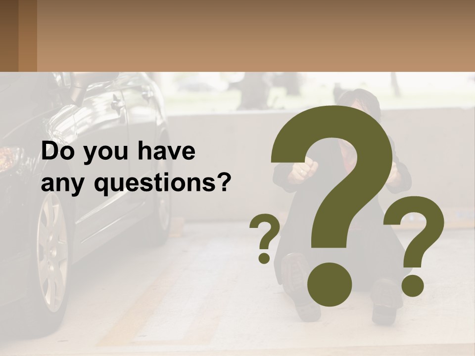 A Woman Sitting On The Ground In Front Of A Car PowerPoint Template