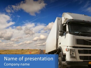A White Truck Driving Down A Rural Road PowerPoint Template