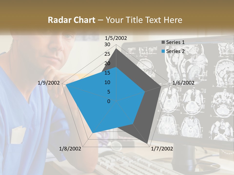 A Man In Scrubs Sitting In Front Of A Computer PowerPoint Template