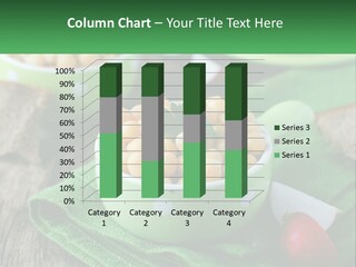 A Green Bowl Filled With Corn On Top Of A Table PowerPoint Template