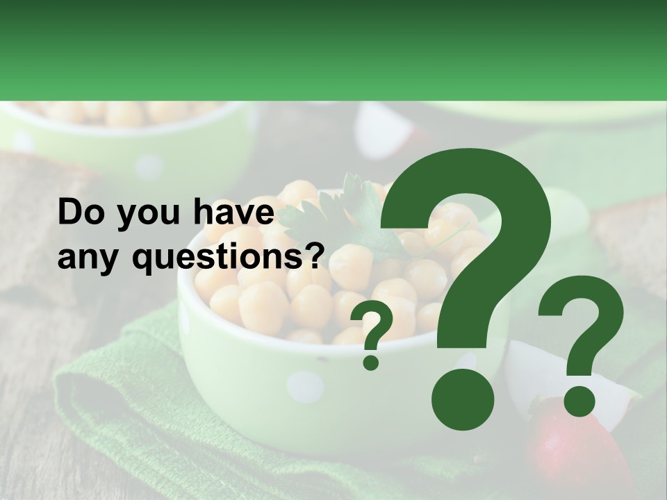 A Green Bowl Filled With Corn On Top Of A Table PowerPoint Template