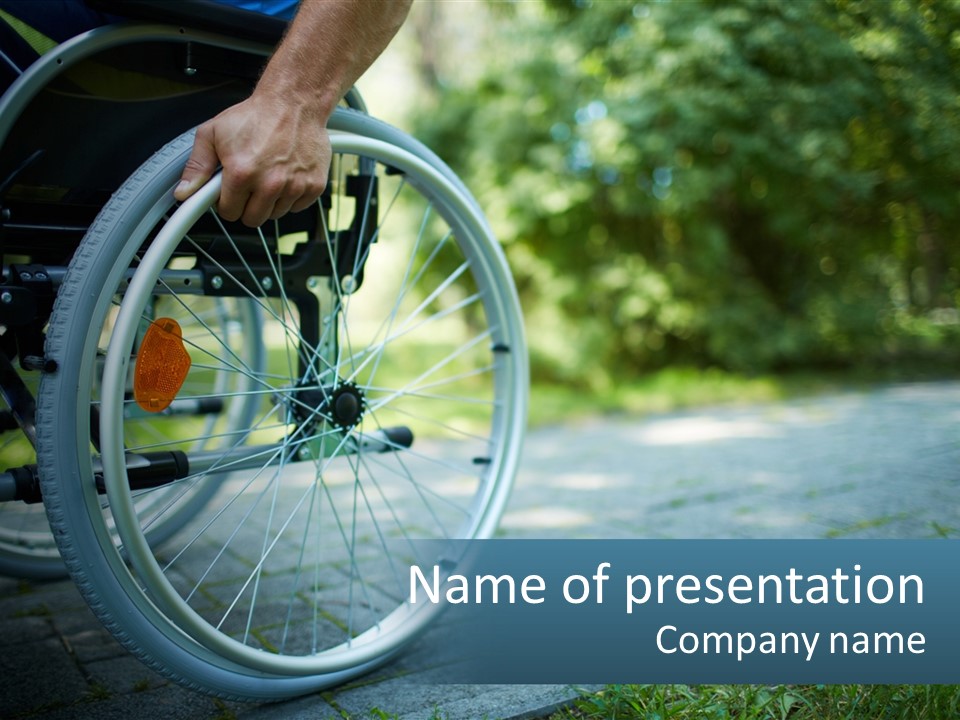 A Person In A Wheel Chair On A Path PowerPoint Template
