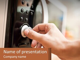 A Person Pressing A Button On A Microwave PowerPoint Template
